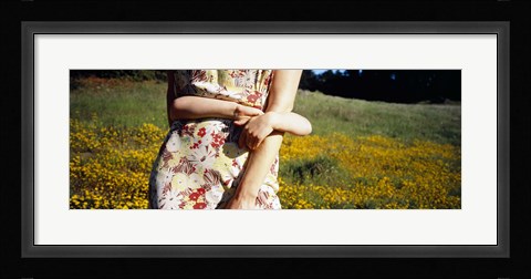 Framed Mid section view of a girl hugging her mother in a field, Marin County, California, USA Print