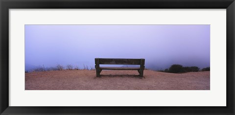 Framed Empty bench in a parking lot, California, USA Print