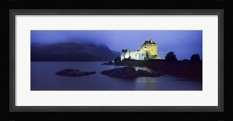 Framed Castle lit up at dusk, Eilean Donan Castle, Loch Duich, Dornie, Highlands Region, Scotland Print