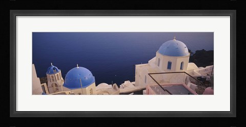Framed High angle view of blue domed church at the coast, Oia, Santorini, Greece Print