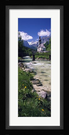 Framed Bridge over stream below country church, Bavarian Alps, Germany. Print