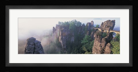 Framed Bridge passing through cliffs, Bastei Bridge, Saxon Switzerland National Park, Dresden, Saxony, Germany Print
