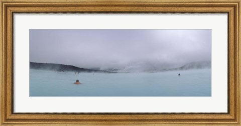 Framed Tourist swimming in a thermal pool, Blue Lagoon, Reykjanes Peninsula, Reykjavik, Iceland Print