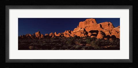 Framed Rock formations on an arid landscape, Arches National Park, Moab, Grand County, Utah, USA Print