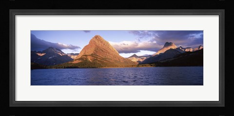 Framed Sunlight falling on mountains at the lakeside, Swiftcurrent Lake, Many Glacier, US Glacier National Park, Montana, USA Print