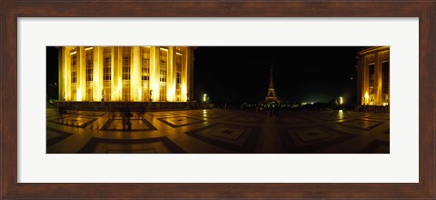 Framed Buildings lit up at night with a tower in the background, Eiffel Tower, Paris, France Print
