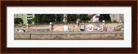 Framed Graffiti on a wall at the riverside, Wien River, Vienna, Austria Print
