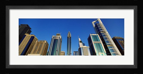Framed Low angle view of buildings, Dubai, United Arab Emirates 2010 Print