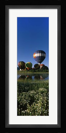 Framed Reflection of hot air balloons in a lake, Hot Air Balloon Rodeo, Steamboat Springs, Colorado, USA Print
