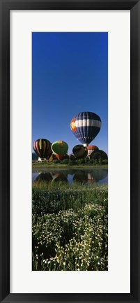 Framed Reflection of hot air balloons in a lake, Hot Air Balloon Rodeo, Steamboat Springs, Colorado, USA Print