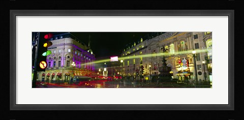 Framed Buildings lit up at night, Piccadilly Circus, London, England Print