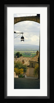 Framed Umbrian countryside viewed through an alleyway, Assisi, Perugia Province, Umbria, Italy Print