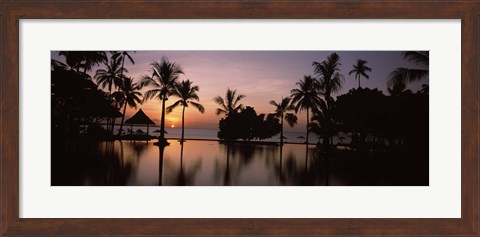 Framed Sunset over hotel pool, Lombok, West Nusa Tenggara, Indonesia Print