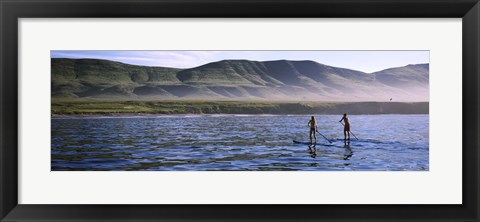 Framed Tourists paddleboarding in the pacific ocean, Santa Cruz Island, Santa Barbara County, California Print