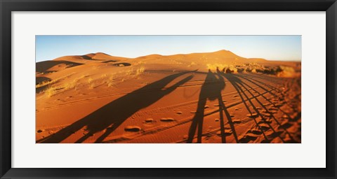 Framed Shadows of camel riders in the desert at sunset, Sahara Desert, Morocco Print