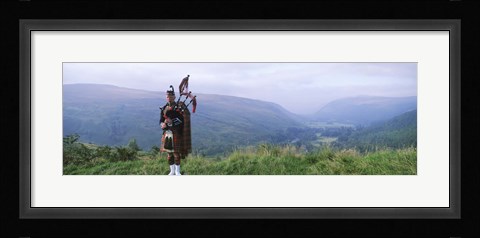 Framed Bagpiper at Loch Broom in Scottish highlands, Ross and Cromarty, Scotland Print