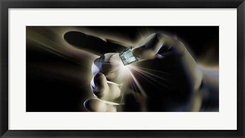 Framed Close-up of a person&#39;s hand holding micro chip Print