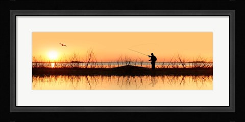 Framed Silhouette of a man fishing Print