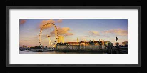 Framed Ferris wheel with buildings at waterfront, Millennium Wheel, London County Hall, Thames River, South Bank, London, England Print