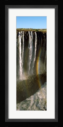 Framed Rainbow forms in the water spray in the gorge at Victoria Falls, Zimbabwe Print