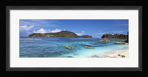 Framed Small fishing boats on Anse L'Islette with Therese Island in background, Seychelles Print