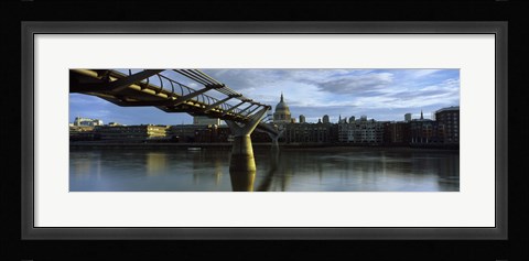 Framed Bridge across a river with a cathedral, London Millennium Footbridge, St. Paul's Cathedral, Thames River, London, England Print