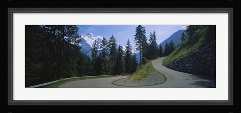 Framed Empty road passing through mountains, Bernese Oberland, Switzerland Print