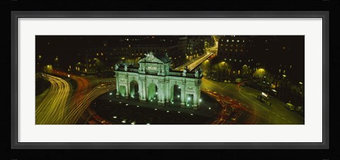 Framed High angle view of a monument lit up at night, Puerta De Alcala, Plaza De La Independencia, Madrid, Spain Print