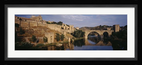 Framed Castle at the waterfront, Puente de San Martin, Tajo River, Toledo, Spain Print