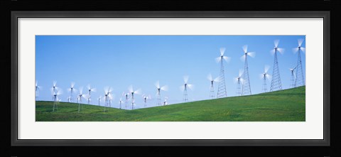Framed Wind turbines spinning on hills, Altamont Pass, Livermore, California, USA Print