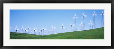 Framed Wind turbines spinning on hills, Altamont Pass, Livermore, California, USA Print