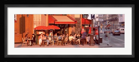 Framed Tourists at a sidewalk cafe, Paris, France Print