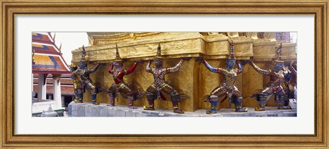 Framed Statues at base of golden chedi, The Grand Palace, Bangkok, Thailand Print