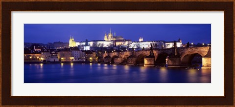 Framed Bridge across a river lit up at night, Charles Bridge, Vltava River, Prague, Czech Republic Print