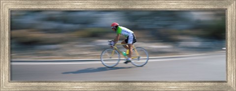 Framed Bike racer participating in a bicycle race, Sitges, Barcelona, Catalonia, Spain Print