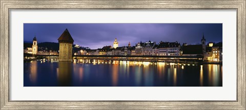 Framed Buildings lit up at dusk, Chapel Bridge, Reuss River, Lucerne, Switzerland Print