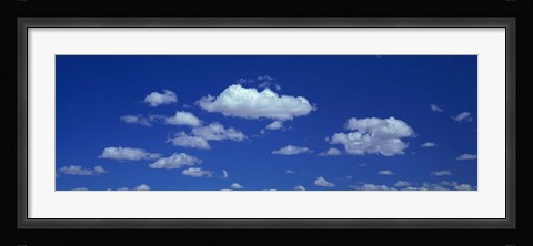 Framed Clouds against a deep blue sky Print