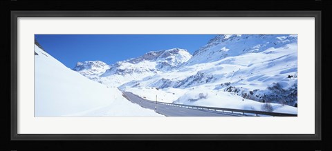 Framed Snow covered mountains on both sides of a road, St Moritz, Graubunden, Switzerland Print