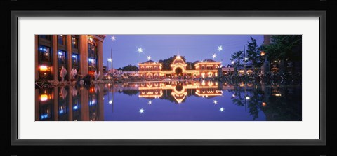 Framed Buildings in an amusement park lit up at dusk, Tivoli Gardens, Copenhagen, Denmark Print