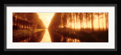Framed Belgium, tree lined waterway through countryside, sepia tone Print