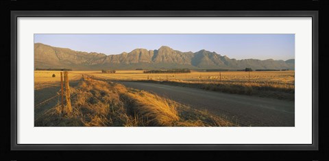 Framed Road running through a farm, South Africa Print