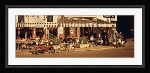 Framed Tourists sitting in a cafe, Sitges Beach, Catalonia, Spain Print