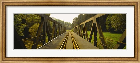 Framed Railroad tracks passing through a bridge, Germany Print