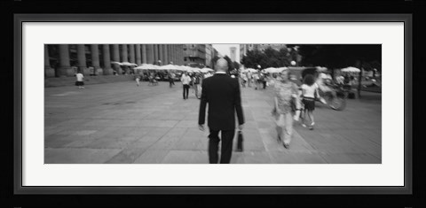 Framed Rear view of a businessman walking on the street, Stuttgart, Germany Print