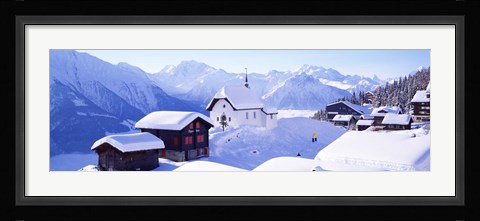 Framed Snow Covered Chapel and Chalets Swiss Alps Switzerland Print