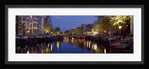 Framed Night View Along Canal Amsterdam The Netherlands Print