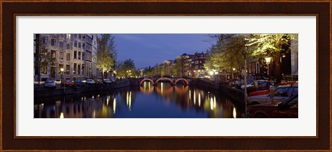 Framed Night View Along Canal Amsterdam The Netherlands Print