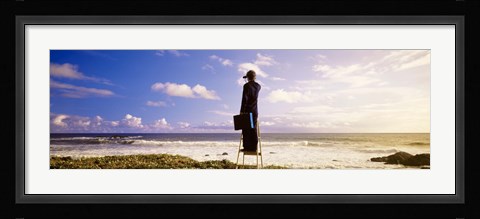 Framed Businessman Standing On A Ladder And Looking Through Binoculars, California, USA Print