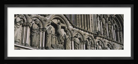 Framed Low angle view of statues carved on wall of a cathedral, Trondheim, Norway Print