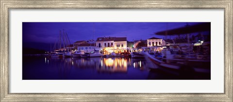 Framed Greece, Cephalonia, Light illuminated on harbor and outdoors cafe Print